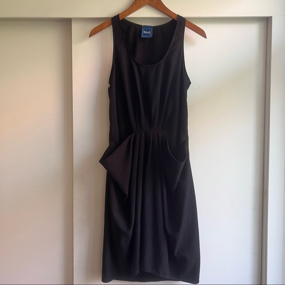 Black dress with front pleats